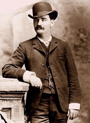 William Barclay “Bat” Masterson in an 1879 portrait wearing a bowler hat